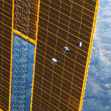 CubeSats being released from the international space station’s Kibo module on 4 October 2012 as photographed by an Expedition 33 crew member.