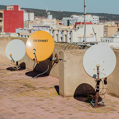 Parabolic dishes on flat roof